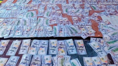 ضبط 50 ألف دولار مزيفة بحوزة متهم في الناصرية