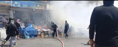 الدفاع المدني يسيطر على حريق شارع النيل في الناصرية وسط خسائر مادية في المحال التجارية