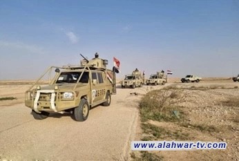 الحشد الشعبي يداهم منطقة الجزيرة بحثا عن بقايا الارهاب الاجرامي