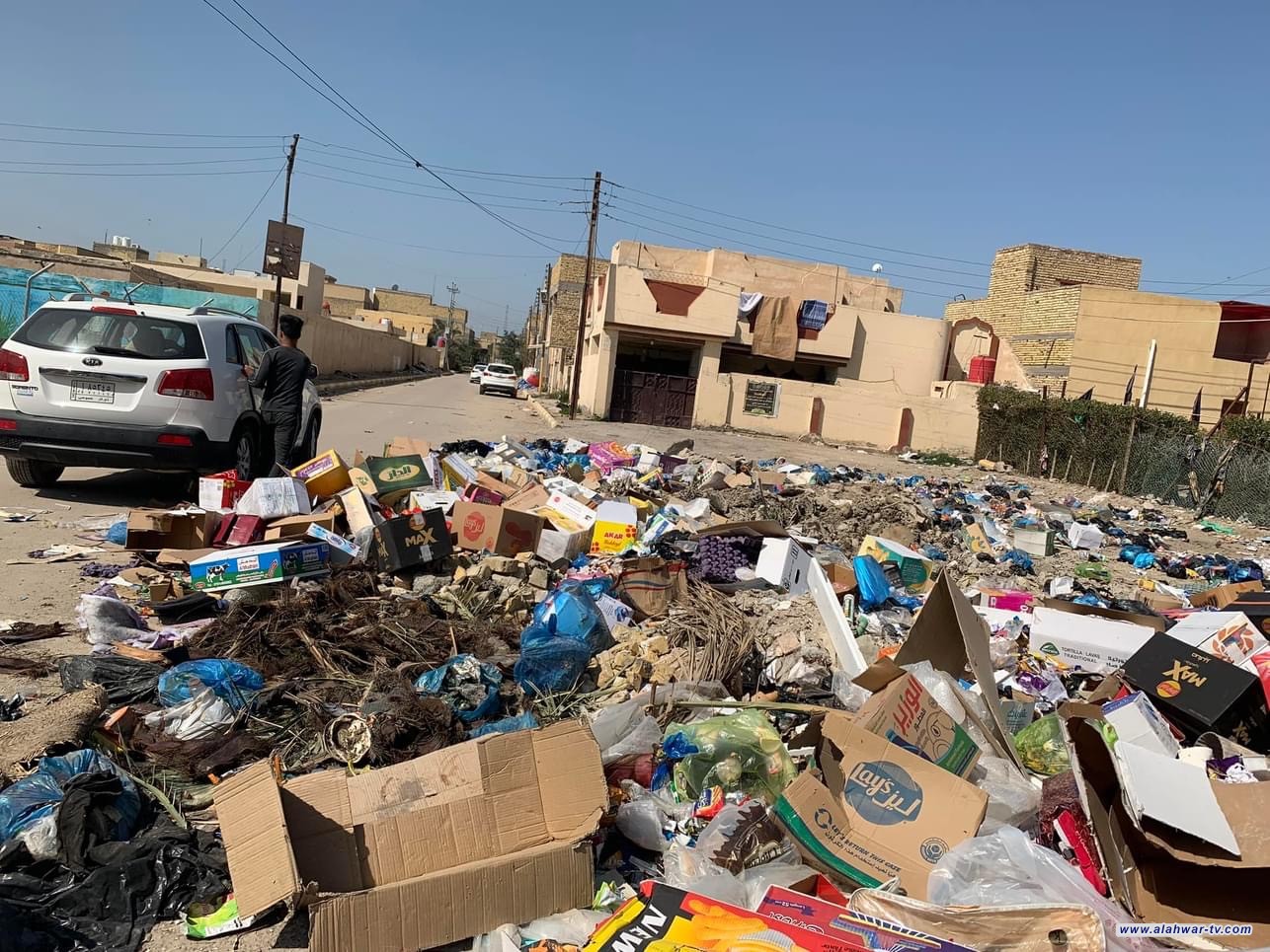 شكاوى من تكدس النفايات في شوارع مدينة الناصرية