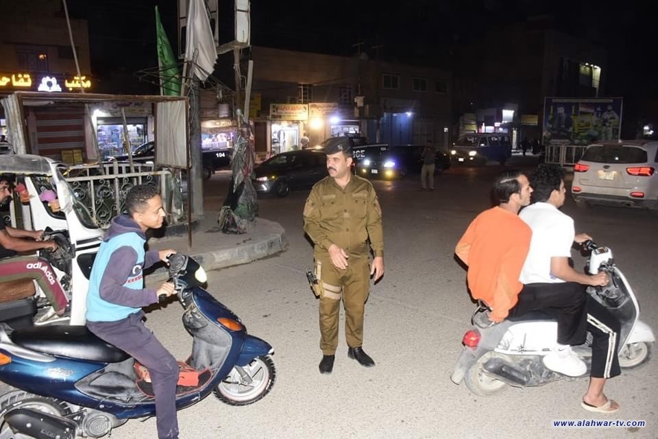 اجراءات امنية مشددة تتخذها  شرطة ذي قار خلال ممارسة أمنية في الناصرية .