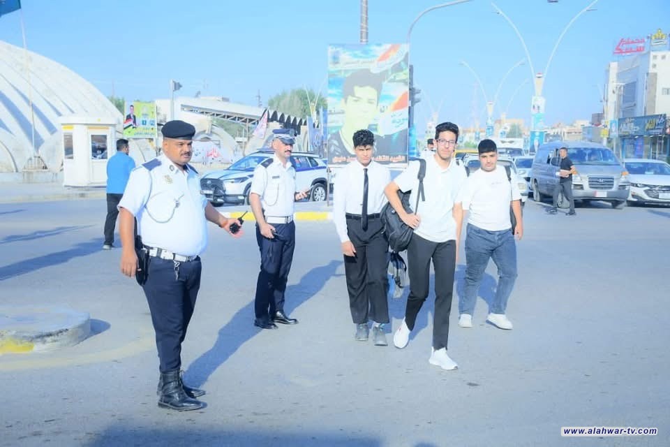 بالصور: مرور ذي قار ينظم الحركة ويؤمن سلامة الطلاب قرب المدارس