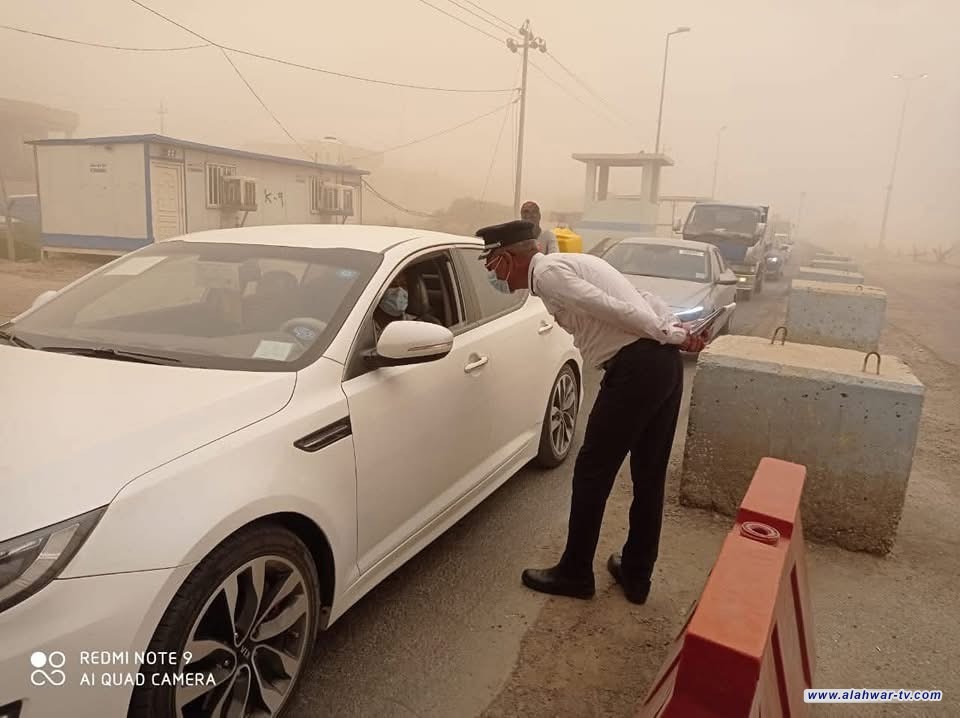 أجواء ترابية كثيفة تدفع مرور ذي قار لإصدار تحذير للسائقين